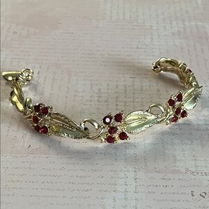 Vintage Star gold tone textured leaf and red rhinestone flowered bracelet